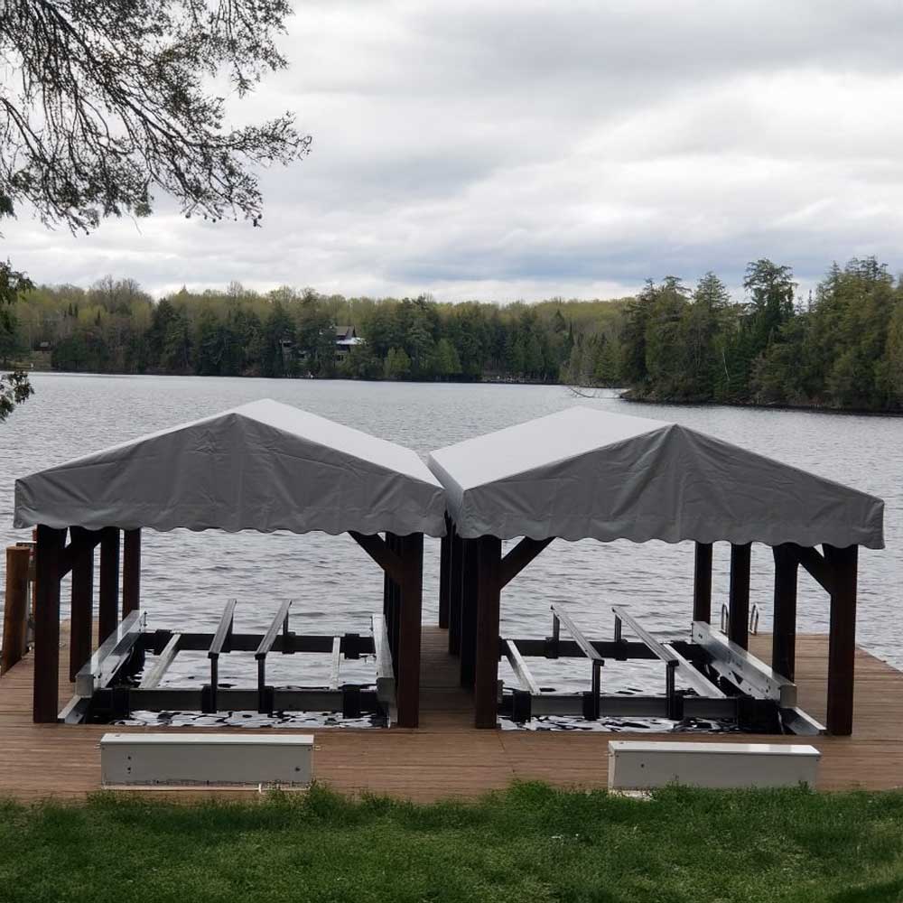 Boat lift replacement canopy shown with side to side lifts