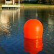 Aqua Lantern 20 inch solar buoy orange day view
