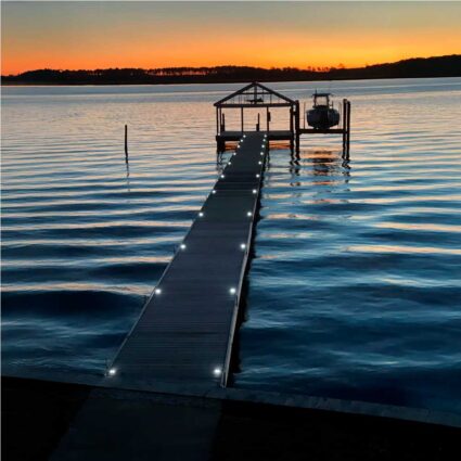 solar-deck-lights-2 solar deck light on dock in water