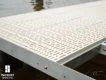 tan poly decking on low profile floating frame
