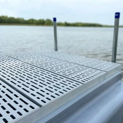 poly-decking-3 low profile floating dock with gray poly decking and side float